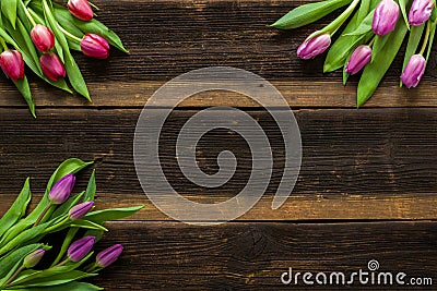 Tulips Flowers on rustic table for March 8, International Women Stock Photo