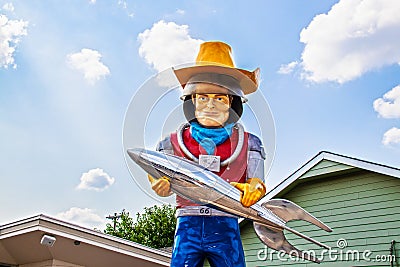 Tulsa OK Buck Atom statue with cowboy hat and rocket roadshide attraction Editorial Stock Photo