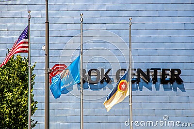 Tulsa USA BOK sign on side of BOK Center with USA Oklahoma and Tulsa flays flying in front - closeup Editorial Stock Photo