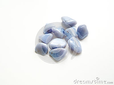 Tumbled Chalcedony Quartz stones close up for crystal therapy tr Stock Photo