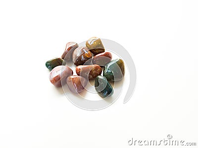 Tumbled jasper stones for crystal therapy treatments and reiki d Stock Photo