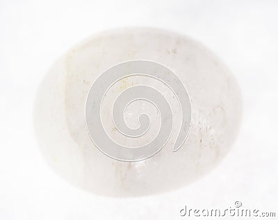 tumbled white translucent agate gemstone on white Stock Photo