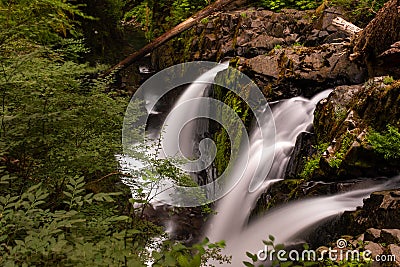 The tumbling waters at Sol Duc Falls, Olympic National Park, Washington, USA, long exposure to create a blurred motion to the Stock Photo