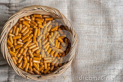Tumeric herb capsule in, Thai herbal medicine for relieve stomach pain Stock Photo