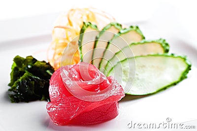 Tuna fish sashimi with cucumber on a white background Stock Photo