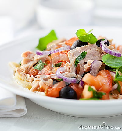 Tuna salad with fresh tomato and pasta Stock Photo