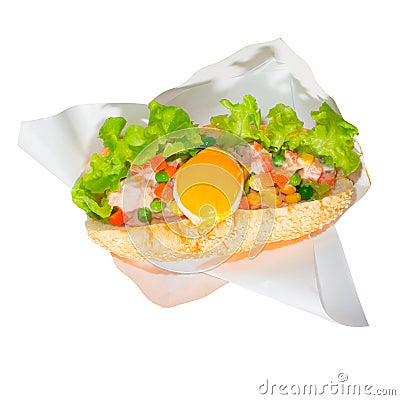 Tuna salad with fried eggs, carrots, green beans, corn and lettuce on bread. Health isolated white background Stock Photo