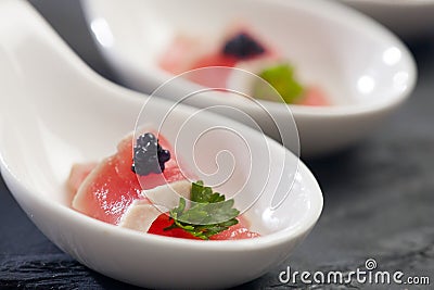 Tuna on a spoon Stock Photo