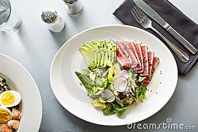 Tuna salad with sliced avocado Stock Photo