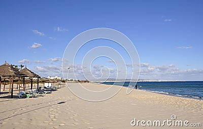 Tunesia: Empty beach in Hamameet-Yasmine. Only one fishermen is Editorial Stock Photo