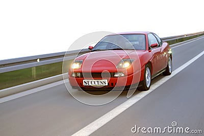 Tuning cars racing down the highway Stock Photo