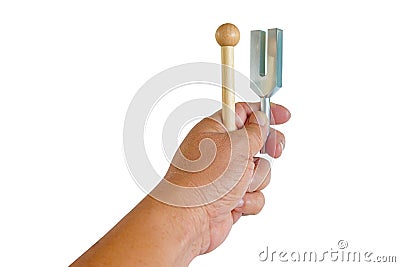 Tuning fork in sound therapy or tunning musical instruments Stock Photo