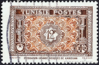 TUNISIA - CIRCA 1947: A stamp printed in Tunisia shows Arabesque Ornamentation from Great Mosque at Kairouan, circa 1947. Editorial Stock Photo