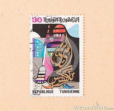 A stamp printed in Tunisia shows a woman cleaning, circa 1986 Editorial Stock Photo