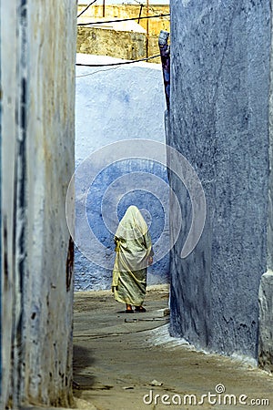 Tunisie. Kairouan. Man walking in the medina Editorial Stock Photo
