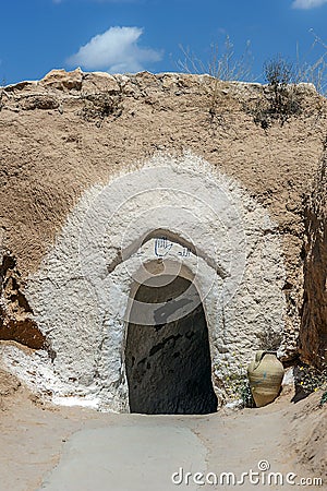Entrance to the cave-dwelling of troglodytes-Berbers. Stock Photo
