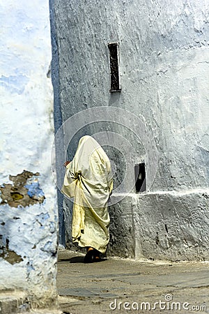 Tunisie. Kairouan. Man walking in the medina Editorial Stock Photo