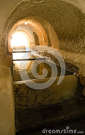Tunnel in ancient stone house Stock Photo