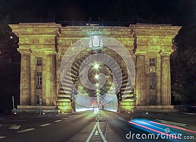 Tunnel in Budapest at night with traffic moving in front. Editorial Stock Photo