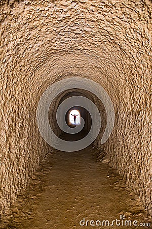 A tunnel that can accommodate only one person, deep, mysterious, incredible Stock Photo