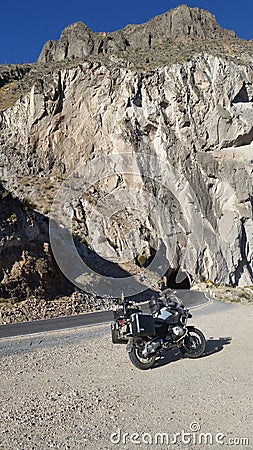 Tunnel mountain road motorcycle desert route asphalt curve Stock Photo