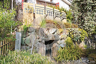 Tunnel remains Sanada-no Nuke-ana at Sanko Shrine in Tennoji, Osaka, Japan. It was used the 1614 Editorial Stock Photo