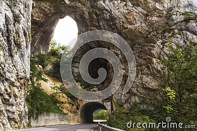 Tunnel on the road by Piva river canyon in the northern Montenegro Stock Photo