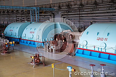 Turbo generator with hydrogen cooling at the machinery room of Nuclear Power Plant Stock Photo