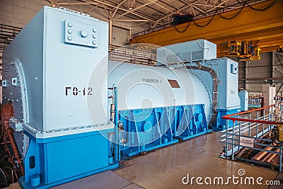 Turbo generator with hydrogen cooling at the machinery room of Nuclear Power Plant Stock Photo