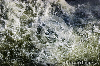 Turbulent whitewash of water downstream from pressure outlet at Lake Hume dam Stock Photo