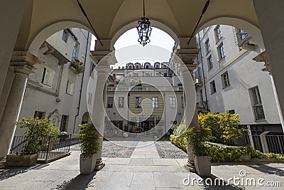 Internal courtyard of a typical house in the historic center of Turin (Torino), Italy Editorial Stock Photo