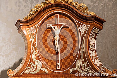 Old crucifix made of wood and ivory. Jesus Christ symbol of resurrection and life after the death Editorial Stock Photo