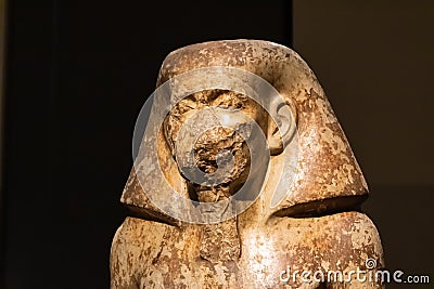 TURIN, ITALY - 25 May 2019: Egyptian statue of governor Wahka at the Egypt Museum - Image Editorial Stock Photo