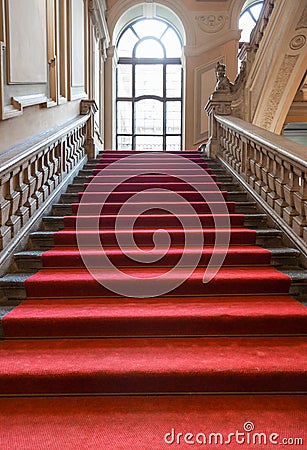 Turin, Italy - Palazzo Barolo staircase. Luxury palace with old baroque interior and red carpet Editorial Stock Photo