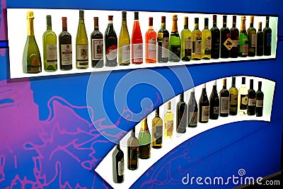 Turin, Piedmont, Italy. -10/26/2009- Fair `Wine show` row of bottles of red and white wines. Editorial Stock Photo