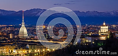 Turin (Torino), night panorama with Mole Antonelliana and Alps Stock Photo