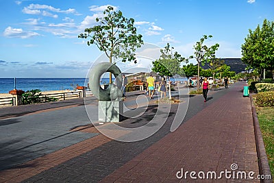 Alanya promenade - Ataturk Boulevard along Kleopatra Beach. Tourists stroll along the alley Editorial Stock Photo