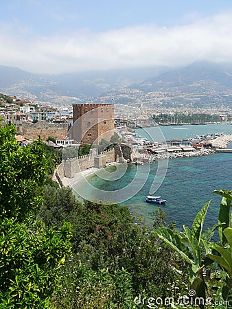 Turkey, Alanya - red tower and harbor Stock Photo