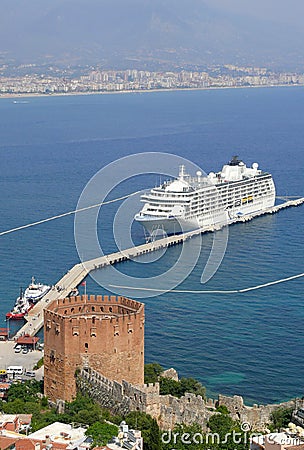 Turkey, Alanya - red tower and harbor Stock Photo