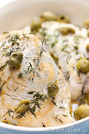 turkey breast baked with green olives and tyme Stock Photo