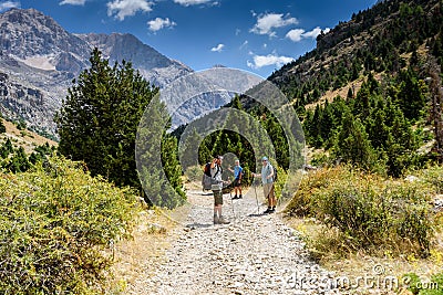 Turkey, Chamard - August 3, 2019: The guide shows tourists the direction of the road through the mountain landscape in Editorial Stock Photo