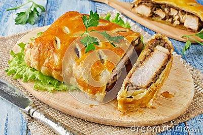 Turkey fillet with mushrooms, baked in puff pastry Stock Photo