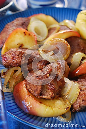 Turkey liver fried with onion and apple Stock Photo