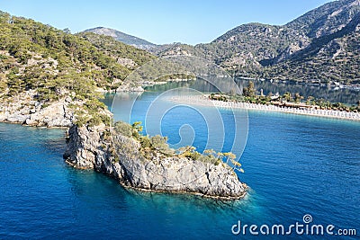 Turkey, scenic beach with white sand surrounded blue sea Stock Photo