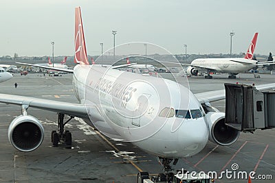 Turkish Airlines airplane boarding at Istanbul Ataturk Airport Editorial Stock Photo