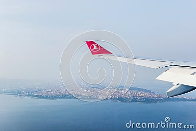 Turkish airplane wing in blue sky Editorial Stock Photo