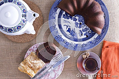 Turkish borek and chocolate cake for tea Stock Photo