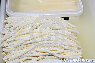 Turkish cheese: full-fat beyaz peynir,yellow kaÅŸar peynir, cecil, topi, burgu peynir, bazaar Stock Photo