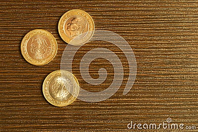 Turkish coins on a wooden background. lira from Turkey close up Stock Photo