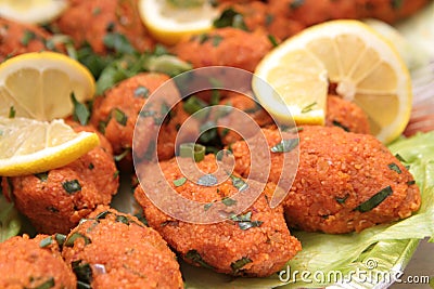 Turkish cuisine. Bulgur and lentil vegetarian dumplings ( Mercimekli Kofte ) Stock Photo